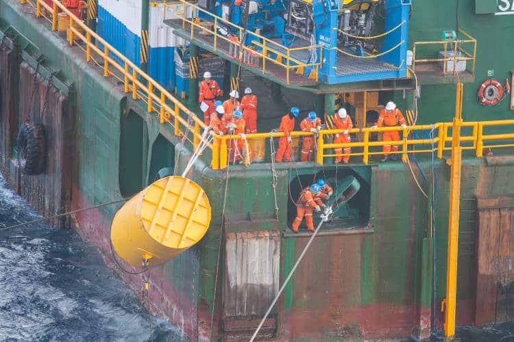 Offshore & Maritime Workers On Sea Platform Barge